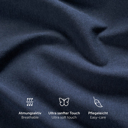 Einzelnes dunkelblau Spannbetttuch aus 100% natürlicher Baumwolle auf Matratze.