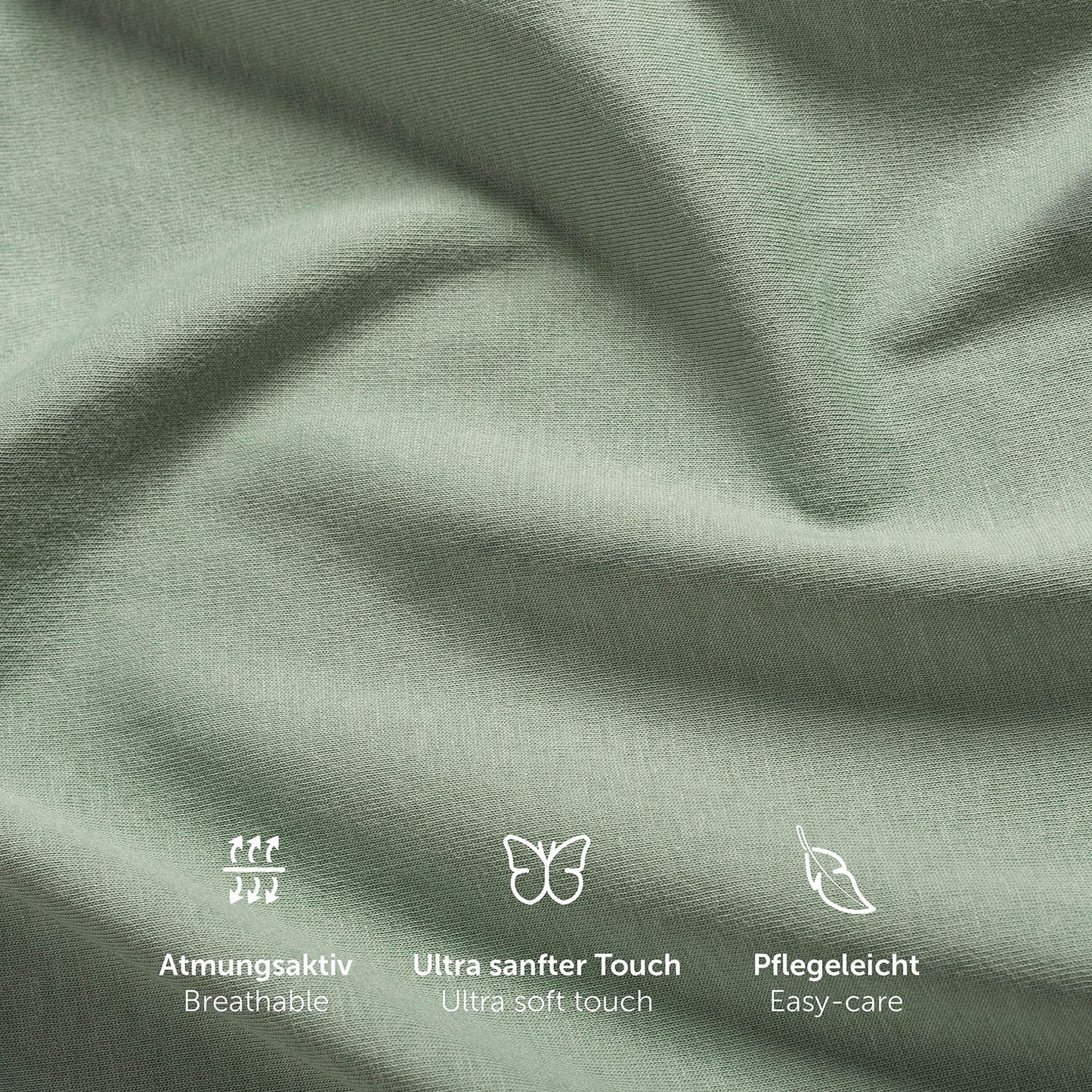 Einzelnes grün Spannbetttuch aus 100% natürlicher Baumwolle auf Matratze.