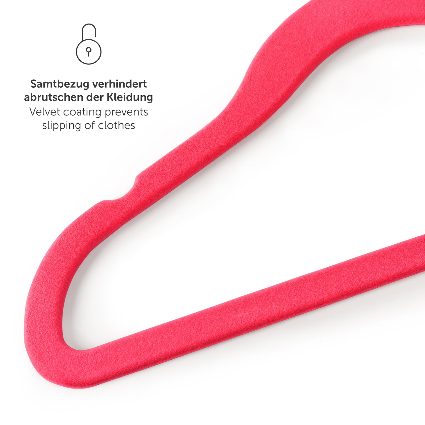 Nahaufnahme eines rosa Kinderkleiderbügels mit samtiger Oberfläche und weißen Punkten Text über verhindertes Abrutschen der Kleidung